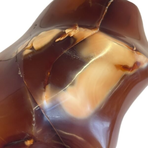 Carnelian flame 3 2 sians emporium Hand carved polished carnelian flame sculpture featuring twisting ridges with deep mahogany red burnt orange tones and smoky chalcedony patches isolated on a white background